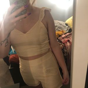 yellow and white striped two piece outfit